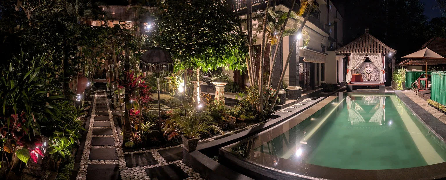 Villa Sakura tropical garden and swimming pool at night