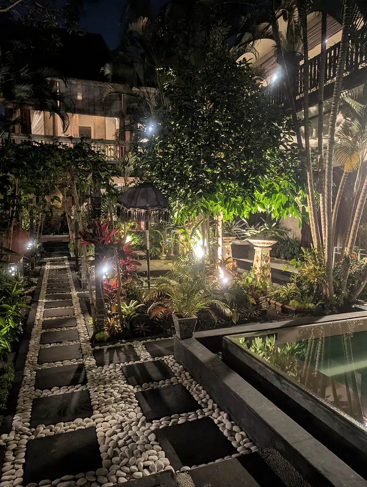The Villa Sakura garden path illuminated at night