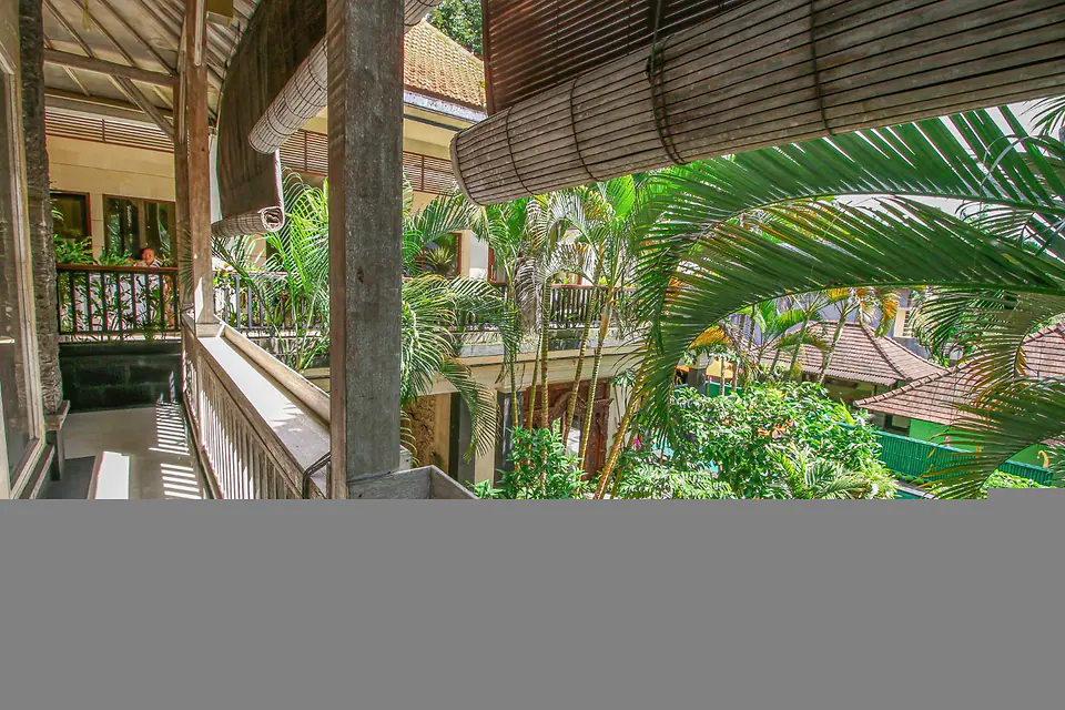 Upper walkway overlooking the tropical garden