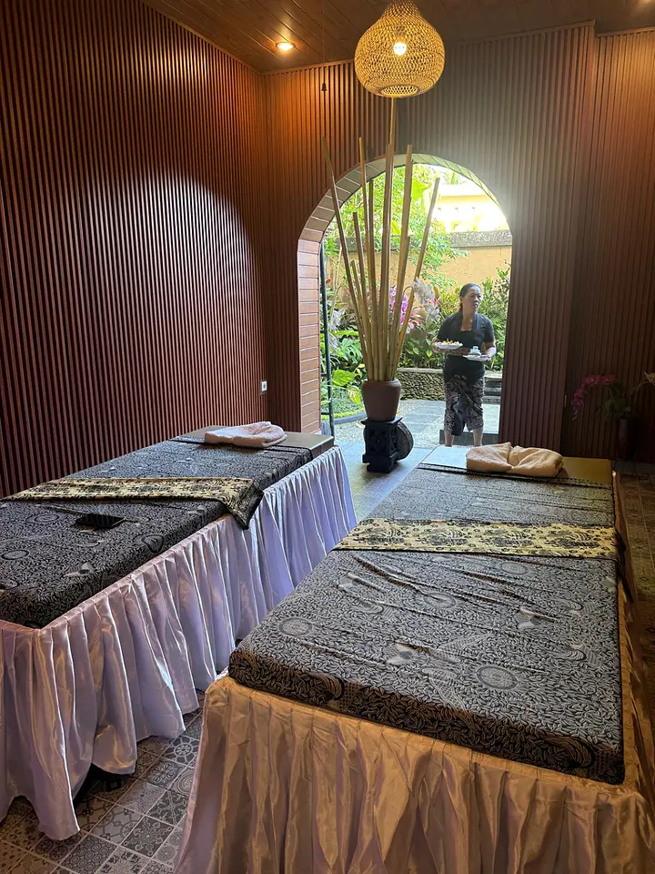 The treatment room opening directly onto the tropical garden